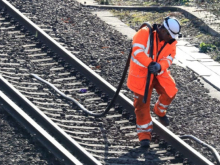 A photograph of a Network Rail track worker