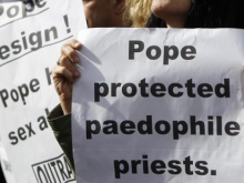 Signs targeting Pope