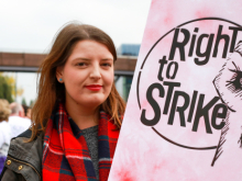 Woman with 'Right to Strike' placard